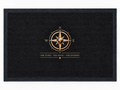 Pexlerian black doormat with gold compass design